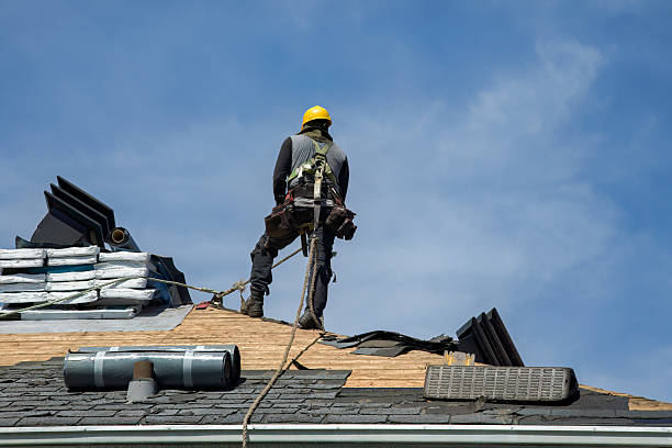 Professional Roofing technician working in Islandia, NY